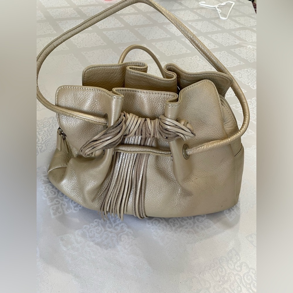 Sandra Robert’s women : fringed Beige color hand bag/ shoulder bag